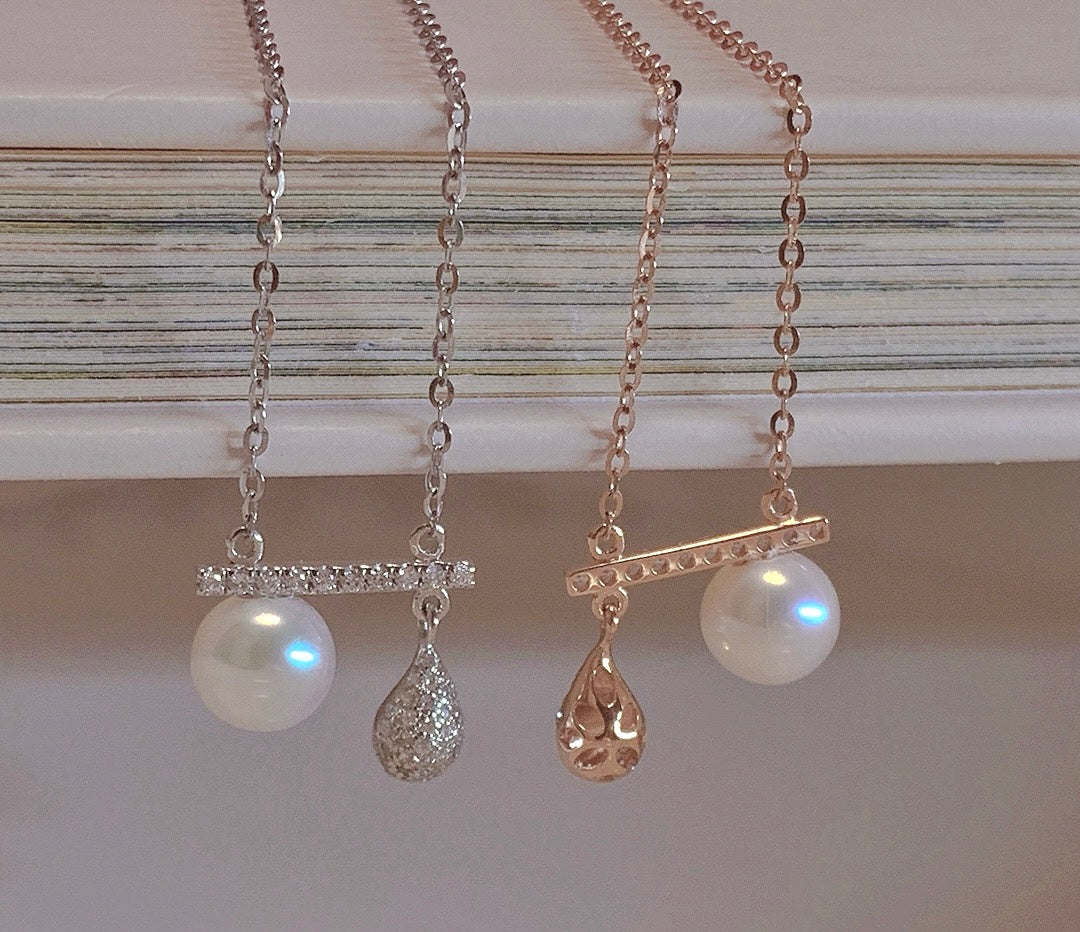 Drop-Shaped Natural Diamond with Seawater Pearl Necklace in 18K Gold